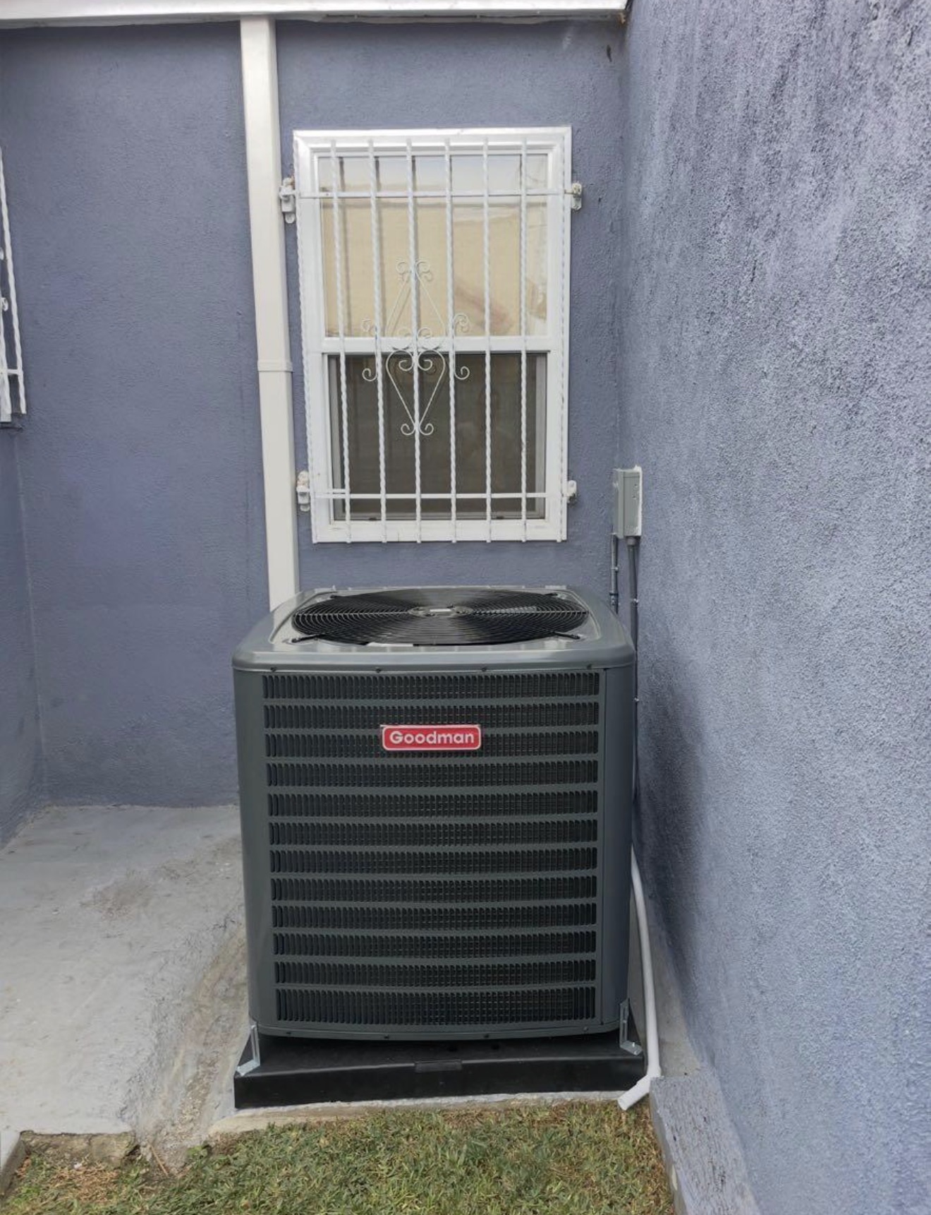 Completed residential condenser installation